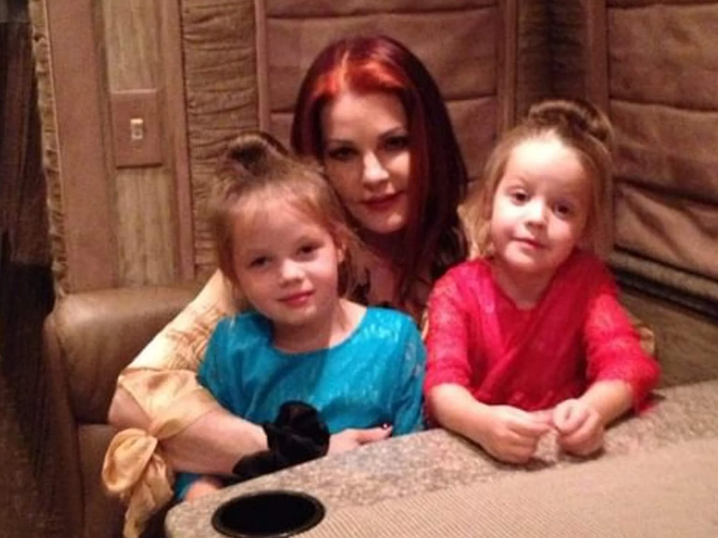 Finley Aaron Love Lockwood with her twin sister Harper Vivienne Ann Lockwood and their grandmother Priscilla Presley.