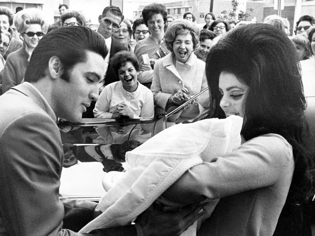 Elvis Presley and Priscilla with Lisa Marie in February 1968